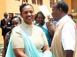 Senatorial aspirants Pasifique Malonga (R) and Jeanne d'Arc Gakuba in Gasabo District yesterday. The New Times /J Mbanda.