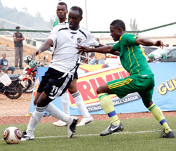 DREAM DEBUT; Olivier Karekezi (left), in his second spell at the club, scored the winning goal for the league champions. The New Times / File photo.