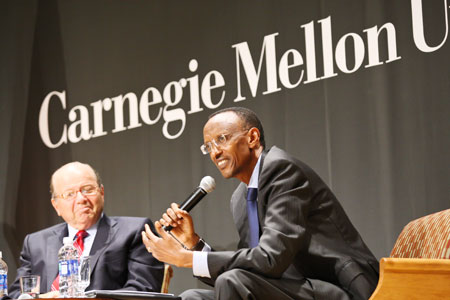 President Kagame addressing students and staff of Carnegie Mellon University. Looking on is the president of the University, Jared Cohon. u00a9Adam Scotti
