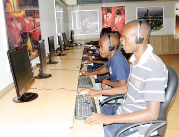 Students carrying out their research via internet. The New Times / J.Mbanda