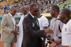APR president Alex Kagame shakes hands with the APR bench ahead of a league match. /File 