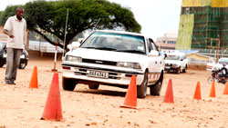 A driving instructor offer a lesson to a learner in Kigali. Driving permit seekers have decried the delays in processing of licences. The New Times /Timothy Kisambira
