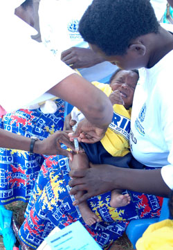 A child gets an immunisation shot. National immunisation campaigns have led to a significant reduction in child mortality.  The New Times /File.