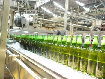 Bralirwa's Mutzing beer brand in the companyu2019s production line. The New Times / File