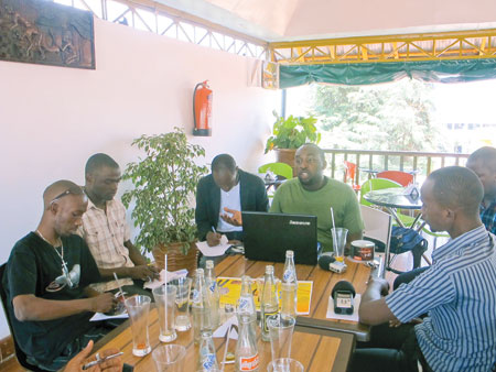 Honoray Iyakaremye (clad in a green T-shirt) addresses journalists during a press conference.The NewTimes /Linda Mbabazi.