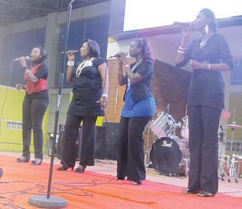 The Sisters on stage.  The New Times / M. Bishop