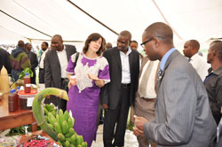 CRS country Director Jeniffer Nazaire chats with Minister Mathias Harebamungu (R) and Governor Celestin Kabahizi. The New Times /Sam Nkurunziza.