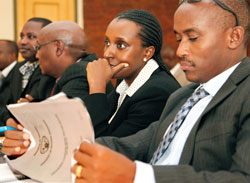 (L-R) Emmanuel Nkurunziza, Frank Rutabinga, Caroline Kayonga, and Janvier Ntarindwa during the Sector Review Meeting Yesterday. The New Times /Timothy Kisambira