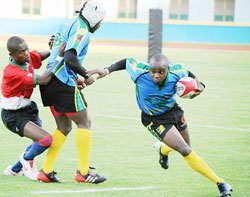 Silverbacksu2019 fullback Vincent Kamali side-steps a Burundian opponent during last yearu2019s CAR15s final. He is one of Rwandau2019s key players. The New Times/File.