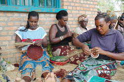 Women weaving the world famous Agaseke. Top US  fashion designer Nicole Miller  will promote handcrafts produced by Rwandan women in the US market. The New Times / File.