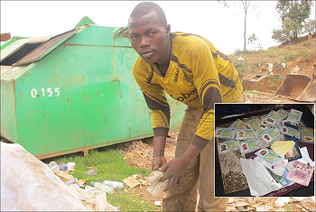 Amri Ntakirutimana, sorting plastic bottles from  the garbage. (Photo. D.Umutesi)
