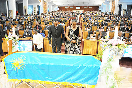  President Kagame and First Lady, Jeannette Kagame pay their respects to the late minister Nyatanyi at Parliament buildings yesterday. The New Times Village Urugwiro.