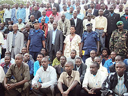  Governor Alphonse Munyentwari, (3rd left-standing front row) and local leaders pose for a group picture at the end of the training. The New Times Daniel Sabiti.