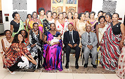 President Kagame and First Lady Jeannette Kagame, Bishop (Rtd) John Rucyahana (R-seated) with members of the Diaspora at the Gala yesterday. The New Times/Village Urugwiro.