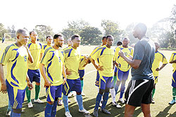 Amavubi interim coach Nshimiyimana passing on tips to his players in one of the teamu2019s training sessions. He wants to make the job his own. The New Times/File photo