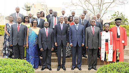 President Kagame with the Ministers shortly after their swearing-in ceremony at the Parliamentary buildings, yesterday. The New Times /Village Urugwiro.