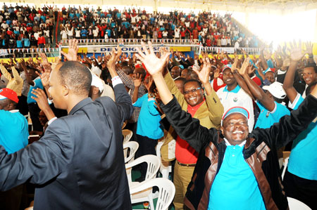 RPF Members dance at the Party Political Bureau meeting on Saturday. The New Times /J Mbanda.