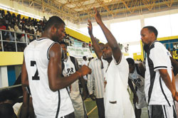APR Coach Cliff Owour (R) passing on some tips to one of his players. The New Times / File.
