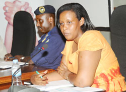 Chief Gender Monitor Oda Gasinzigwa (L) and ACP Vianney Nshimiyimana at the meeting yesterday. The New Times / J Mbanda