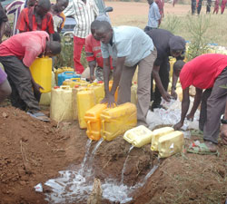 Hundreds of litres of Illicit brew was destroyed. The New Times / Courtesy.