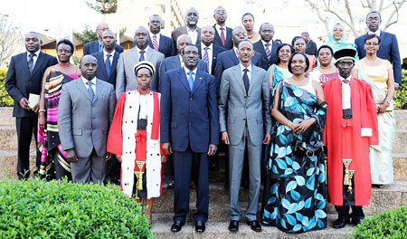  President Kagame with the Senators shortly after the swearing-in ceremony at the Parliamentary buildings, yesterday. The New Times / Village Urugwiro.