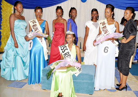All Smiles! Miss KHI Sandra Kayitesi poses for a photo session with other contestants. The New Times / Courtesy.