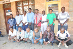 The suspects under police custody. The New Times / Courtesy.