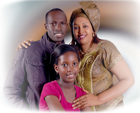 Christopher Mwungura (L) poses with his co-stars.