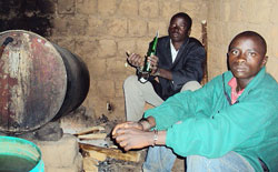 Suspects at their brewing joint in Mbare, Shyogwe. The New Times / D.Sabiiti