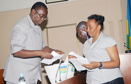  The Senate VP  Bernard Makuza presides over the voting exercise in Senate yesterday, assisted by Senators Teddy Gacinya (R) and Evariste Bizimana. The New Times /John Mbanda