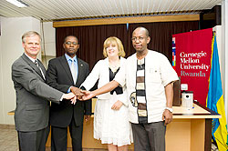 Bruce Krogh, Director, CMU Rwanda, State Minister Dr Mathias Harebamungu, AfDB's  Dr. Agnes Soucat and John Gara of RDB after announcing the partnership The New Times Courtesy