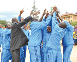 Police players celebrate after being crowned 2011 national handball league champions over the weekend. The New Times / B. Mugabe