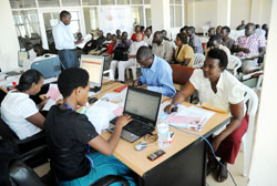 Local investors filling business regestration forms at Rwanda Development Board. The New Times/File.