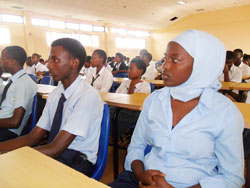Students listen  during a presentation at the launch of the Anti-Drug Campaign. The New Times  / Grace Mugoya