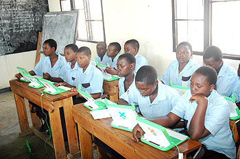 Computers in schools will enhance computer literacy among our children. The New Times File.