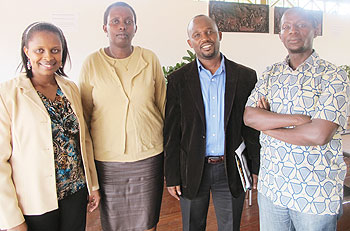 Pastor Florence Mugisha (L) poses for a group photo with other members of New Life Bible Church shortly after the press 