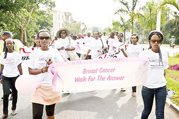 Young Rwandan women walk during the program aimed at supporting breast cancer  awareness. (Net Photo.)