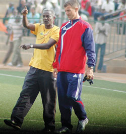 BACK IN THE DAYS: Milutin Micho Sredojevic listens to his assistant during a friendly match between APR and Ethiopiau2019s St. George. The New Times/File.