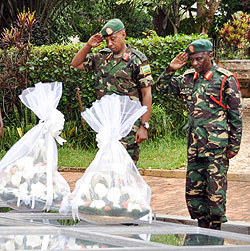 Lt. Gen. Abdulhaman Shimbo, the Tanzania Peopleu2019s Defence Force (TPDF) Deputy Chief of Staff (R) and Col. George Rwigamba, the Kigali Regional Reserve Force Commander, pay respect to the victims of the 1994 Genocide at Kigali Memorial Centre yesterday. Th