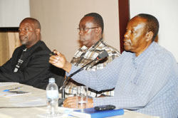 L-R; Wellars Gasamagera, Bernard Makuza and Bertin Makuza protesting Rusesabagina's being awarded. The New Times / John Mbanda.