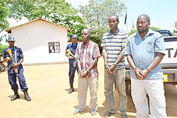 L-R: Suspects Faustin Sekamana, Manasseh Matabaro and Nteziryayo at Bugesera police station yesterday. 
