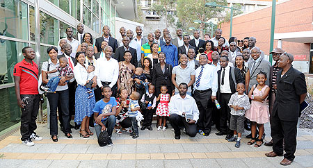 Foreign Affairs Minister Louise Mushikiwabo (middle, in black) with members of the Rwandan Diaspora in Australia yesterday. The minister had accompanied President Kagame to CHOGM in Perth, Australia, which ended yesterday. The New Times/ Village Urugwiro