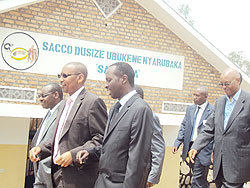 Finance Minister, John Rwangombwa (C) accompanied by Clavier Gatete, Governor of the central bank (L), and Governor Alphonse Munyentwari in Kamonyi yesterday. The New Times / D. Sabiiti.