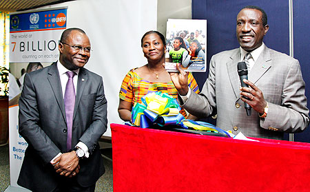 (L-R) UN Resident Coordinator Aurelien Agbenonci, Victoria Akyeampong, the UNFPA Representative, and Senate President, Dr. Jean Damascene Ntawukuriryayo, during the launch of the World Population Report 2011, in Kigali, yesterday. The New Times/ Kisambira