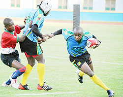 Silverbacksu2019 Vincent Kamali side-steps a Burundian opponent during last year's CAR 15s final. He is one of Rwanda's key players. The New Times/File.