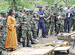 Chief of Staff RDF Lt. Gen Ceasar Kayizari (3rd left) chats with Eastern Province Governor Aisa Kirabo as other officers look on in Gabiro yesterday. The New Times / Edwin Musoni.