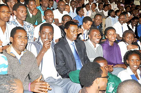 Defence Minister Gen. James Kabarebe (in a neck tie) with members of AERG yesterday. The New Times / J. Mbanda.