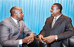 Habumurenyi (L) swith senate president Dr Jean Damascene Ntawukuriryayo before the former's presentation in parliament yesterday.  The New Times / Timothy Kisambira