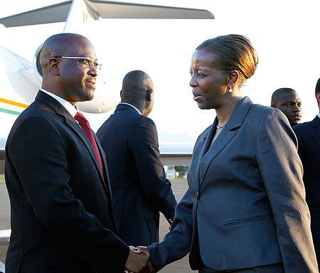 Foreign Affairs Minister, Louise Mushikiwabo, greets Guillaume Soro, the Prime Minister of Ivory Coast, on his arrival at Kigali International Airport. The New Times /Timothy Kisambira.