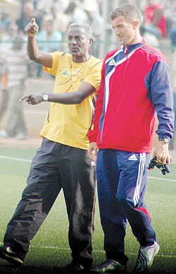 Milutin Micho Sredojevic (R) is thought to be earning close to Rwf10m a month. The New Times / File photo